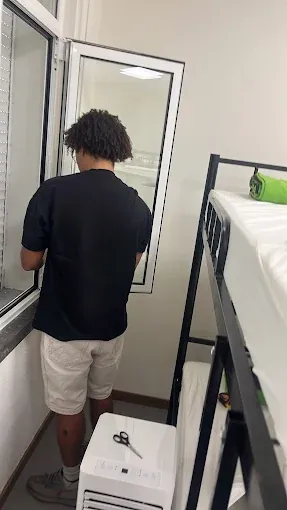 Rental portable air conditioner set up in a bedroom in Lisbon