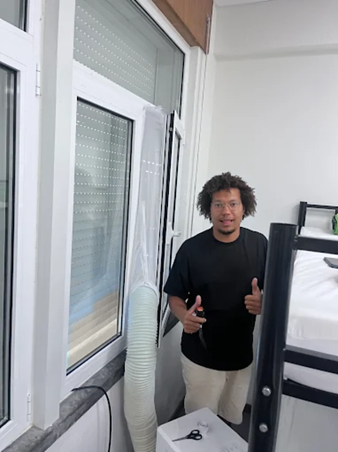 Portable air conditioner rental ready to use, hose through the window, in a Lisbon flat